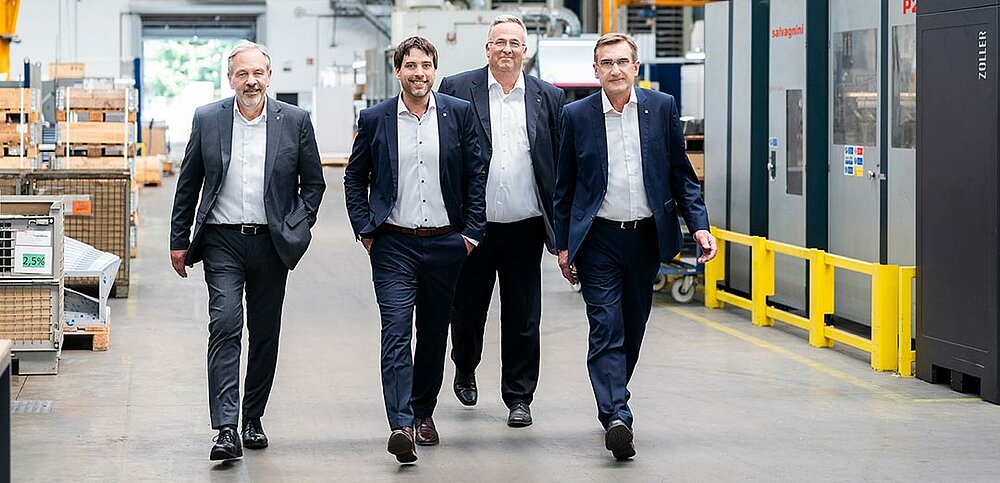 Vertriebsleiter Frank Niedermaier, Technischer Geschäftsführer Kai Klenk, Kaufmännischer Geschäftsführer Achim Hinterkopf und Produktionsleiter Lothar Weber